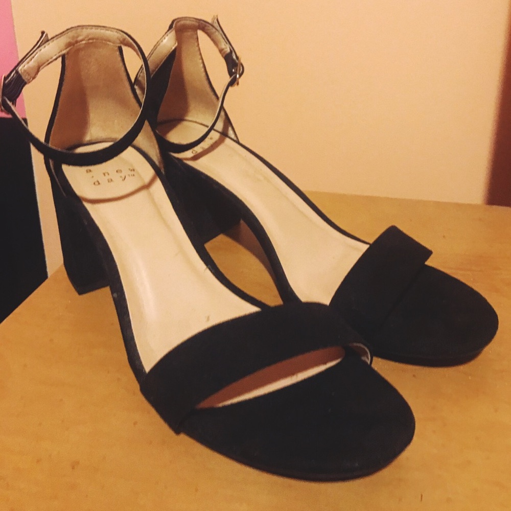 Black heel sandals.